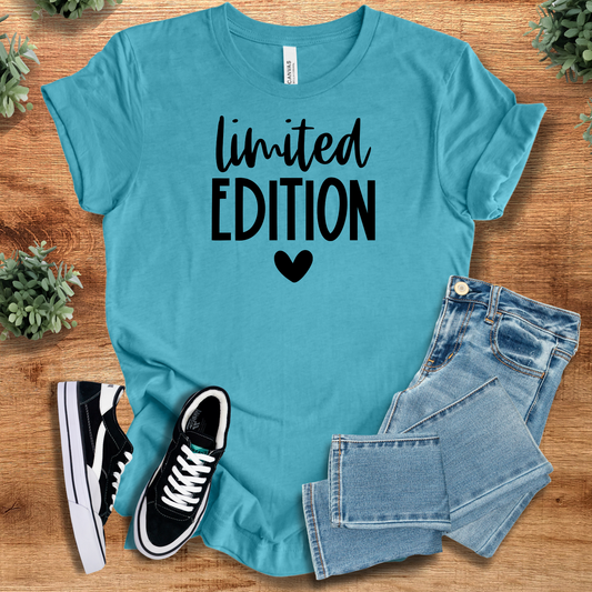 Limited Edition Cotton Tee in turquoise with black text and heart graphic. Classic unisex short sleeve shirt made from 100% cotton for casual wear.