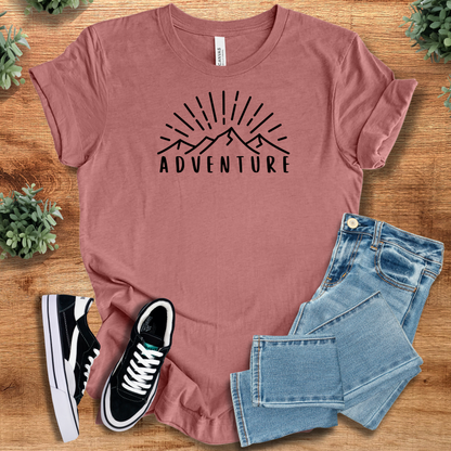 Soft-cream t-shirt with '' text, flat lay styled on a wooden surface.