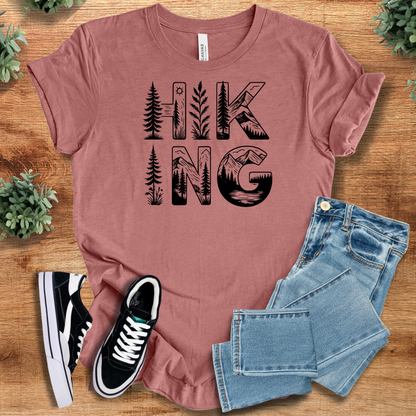 Soft-cream t-shirt with '' text, flat lay styled on a wooden surface.