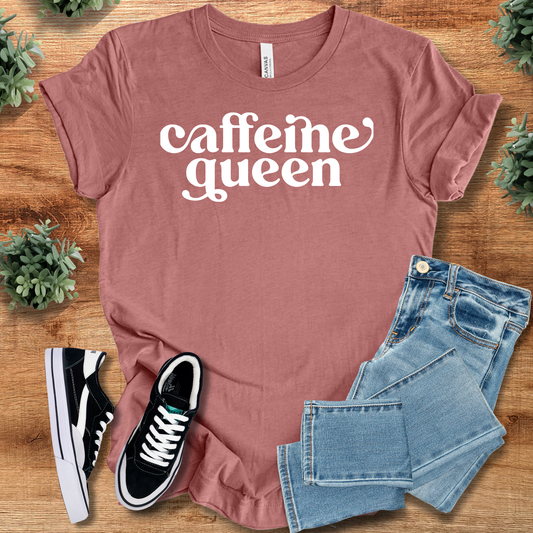 Caffeine Queen - Coffee Lovers T-Shirt in mauve pink with bold white text. 100% cotton tee styled with jeans and sneakers for casual wear.
