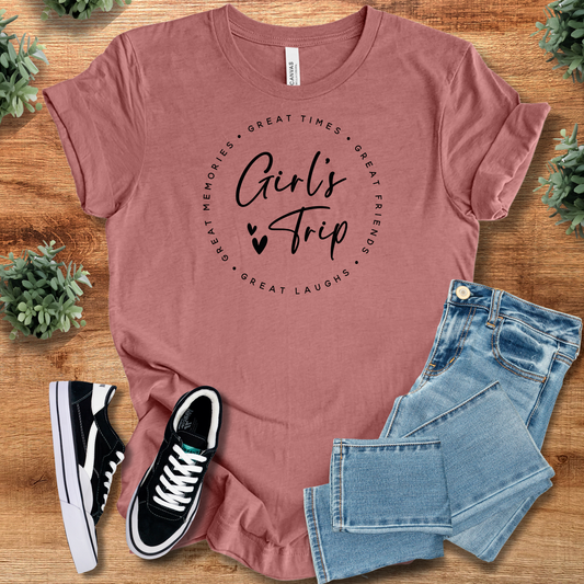 Girls Trip 2025 T-Shirt in mauve with black script text, styled with jeans and sneakers. Ideal for vacation, reunions, or matching group outfits.