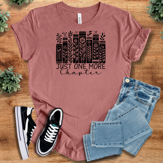 Mauve Just One More Chapter Tee for book lovers with floral book spine design, perfect casual reading shirt in 100% cotton.