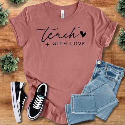 Heather-aqua t-shirt with '' text, flat lay styled on a wooden surface.