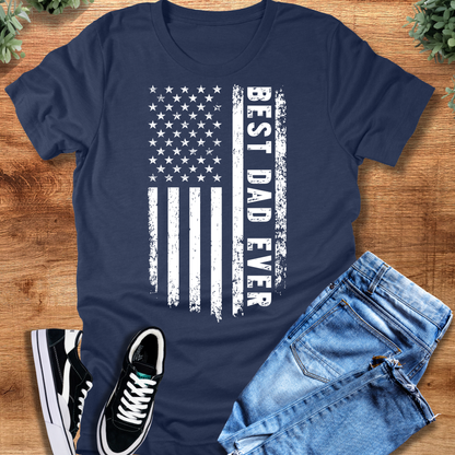 Black t-shirt with '' text, flat lay styled on a wooden surface.