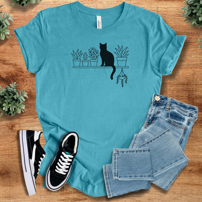 Heather-mauve t-shirt with '' text, flat lay styled on a wooden surface.