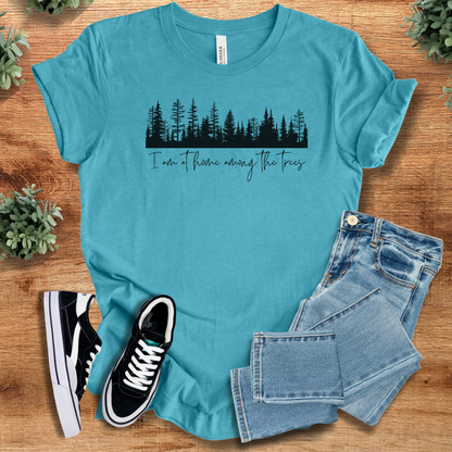 Soft-cream t-shirt with '' text, flat lay styled on a wooden surface.