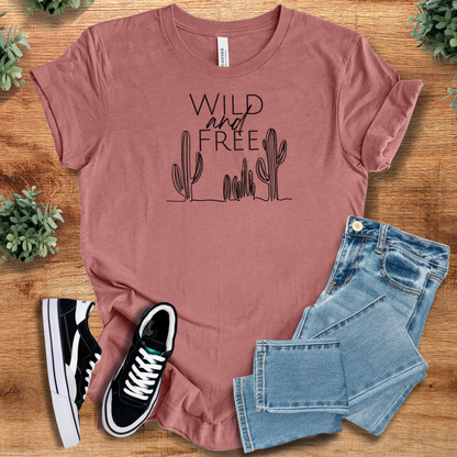 Heather-navy t-shirt with '' text, flat lay styled on a wooden surface.