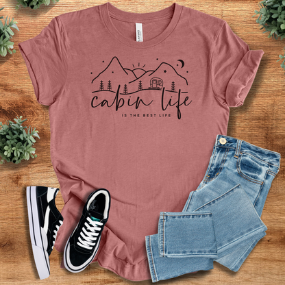 Yellow t-shirt with '' text, flat lay styled on a wooden surface.