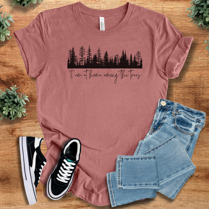Soft-cream t-shirt with '' text, flat lay styled on a wooden surface.
