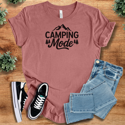 Heather-aqua t-shirt with '' text, flat lay styled on a wooden surface.