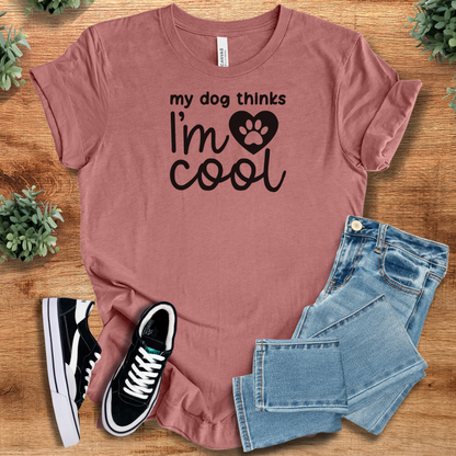Heather-aqua t-shirt with '' text, flat lay styled on a wooden surface.