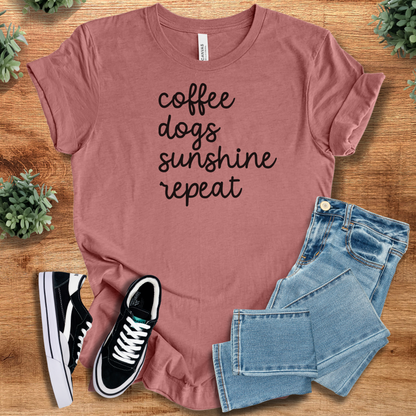 Heather-aqua t-shirt with '' text, flat lay styled on a wooden surface.