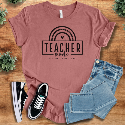 Soft-cream t-shirt with '' text, flat lay styled on a wooden surface.