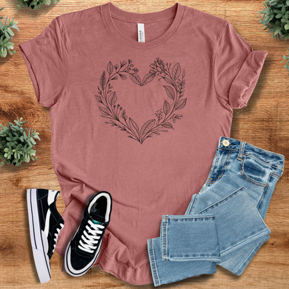Soft-cream t-shirt with '' text, flat lay styled on a wooden surface.