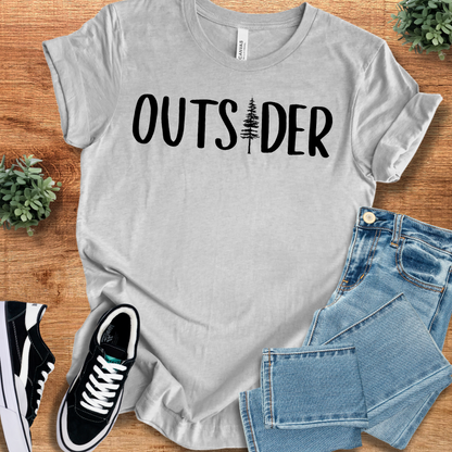 Athletic-heather t-shirt with 'Outsider T‑Shirt' text, flat lay styled on a wooden surface.