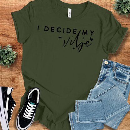 Heather-mauve t-shirt with '' text, flat lay styled on a wooden surface.