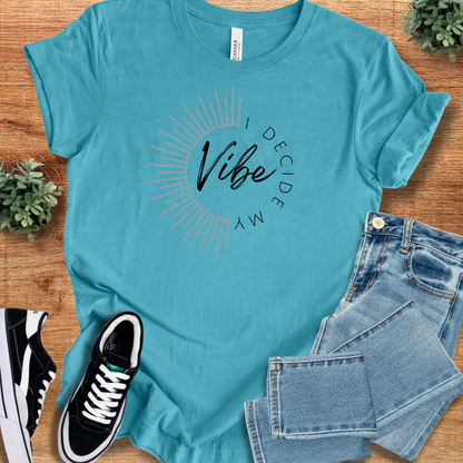 Athletic-heather t-shirt with '' text, flat lay styled on a wooden surface.