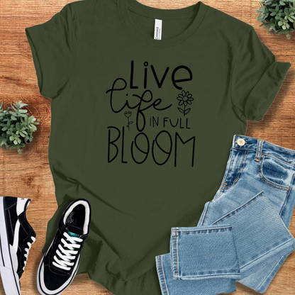 Heather-aqua t-shirt with '' text, flat lay styled on a wooden surface.