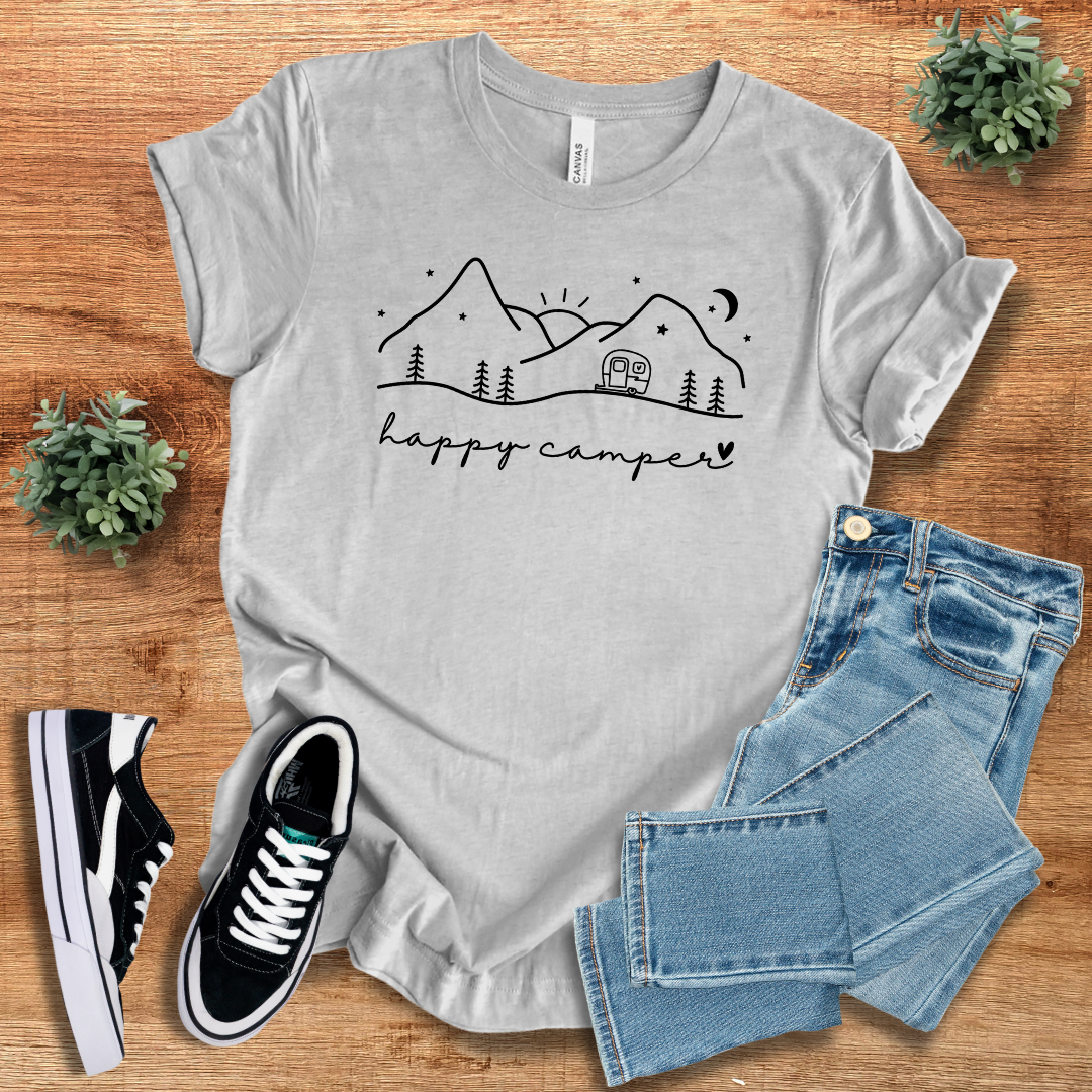 Heather gray Happy Camper T-shirt with a black mountain and camper print. Soft cotton, classic crew neck, perfect for casual outdoor wear.