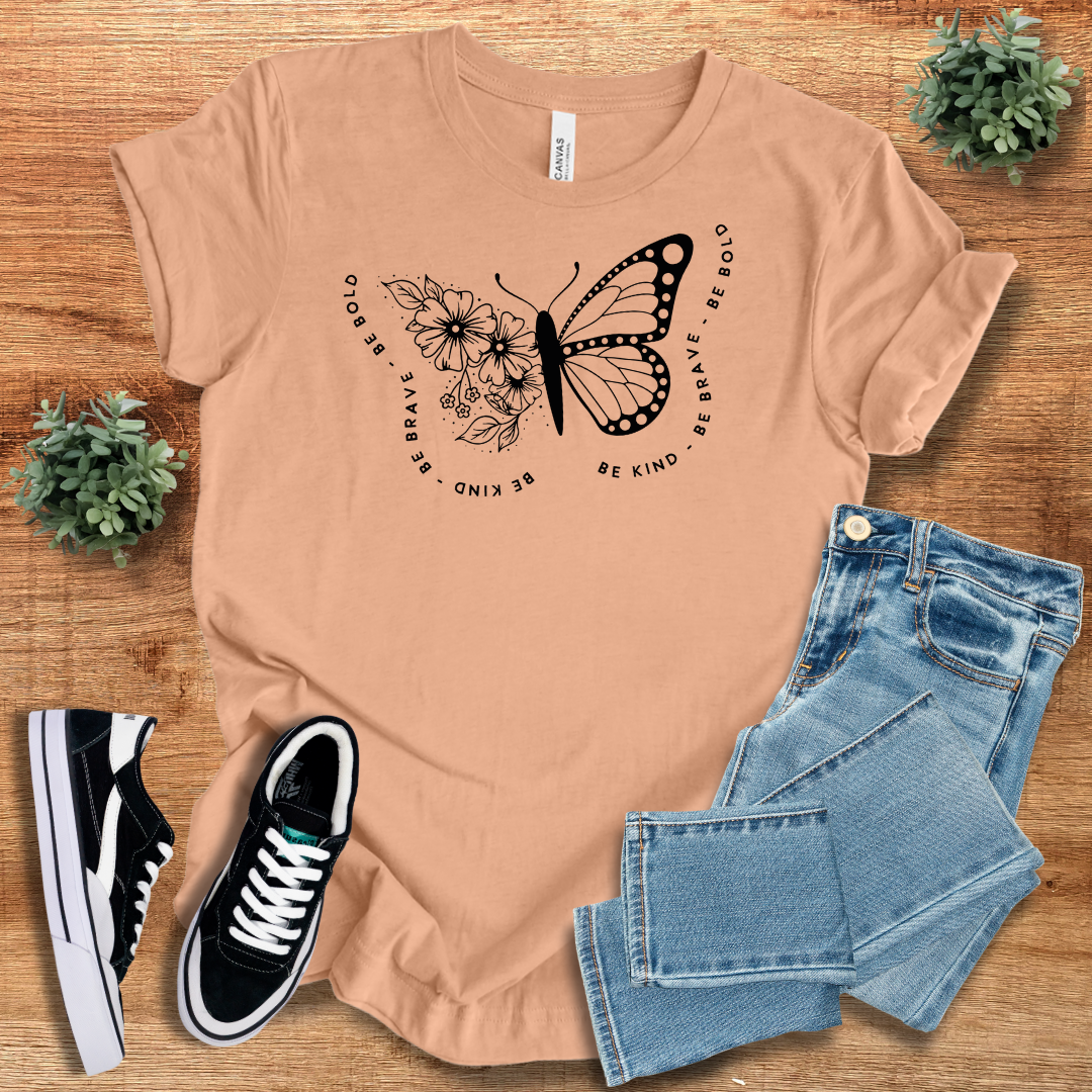 Peach Butterfly Tshirt Classic Unisex Soft Cotton Tee featuring a floral butterfly print and motivational text. Soft, breathable fabric for all-day comfort.