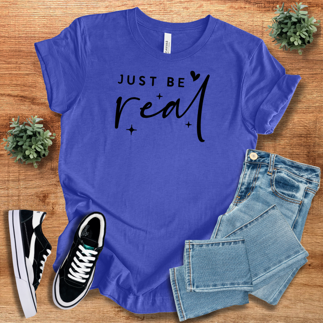 Just Be Real T-shirt in royal blue with black script design. Breathable fabric unisex short sleeve tee, great for everyday essentials.