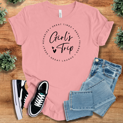Heather-mauve t-shirt with '' text, flat lay styled on a wooden surface.