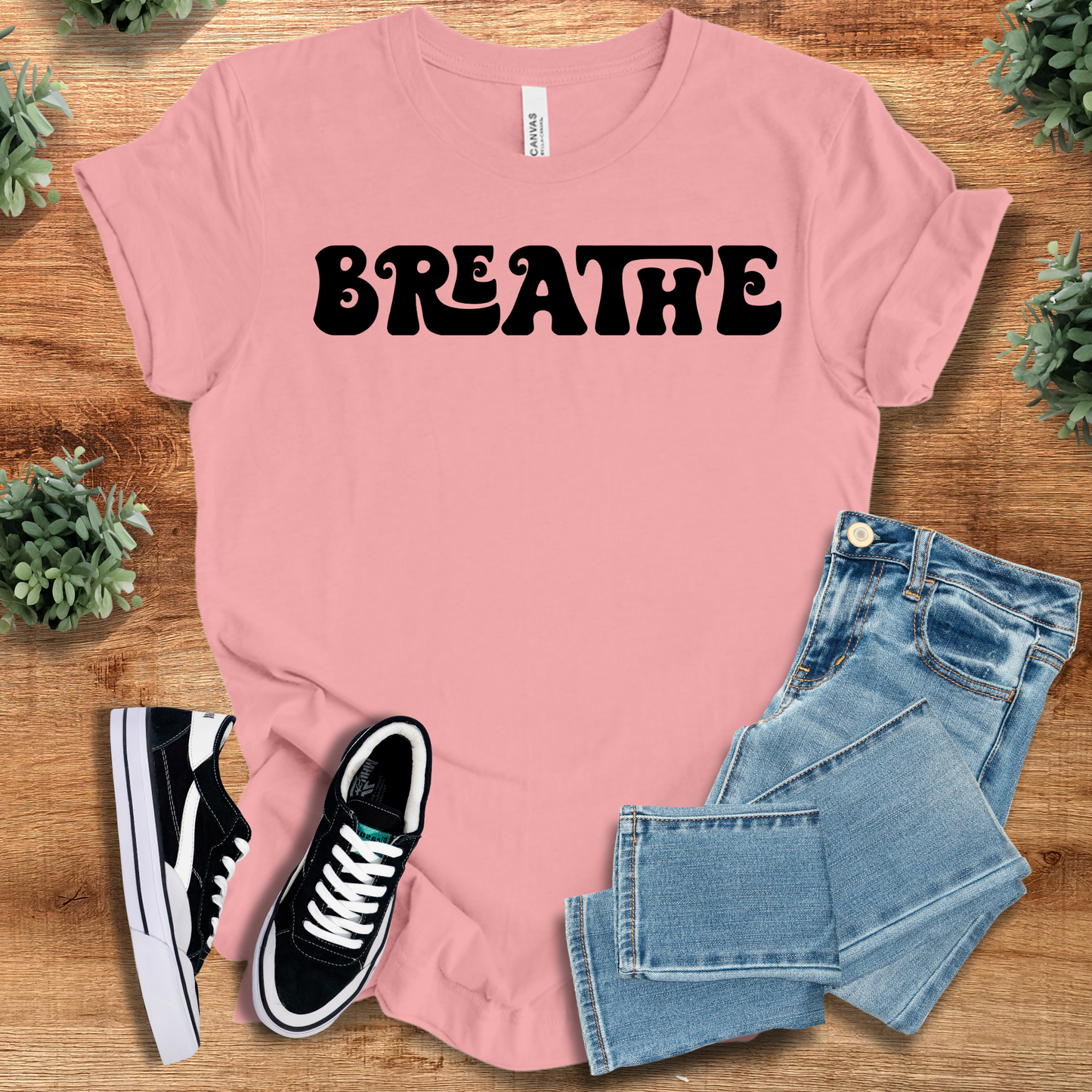 Retro Style T-Shirt - Breathe Tee in light pink with bold black text. 100% cotton shirt designed for comfort and bohemian-inspired everyday wear.