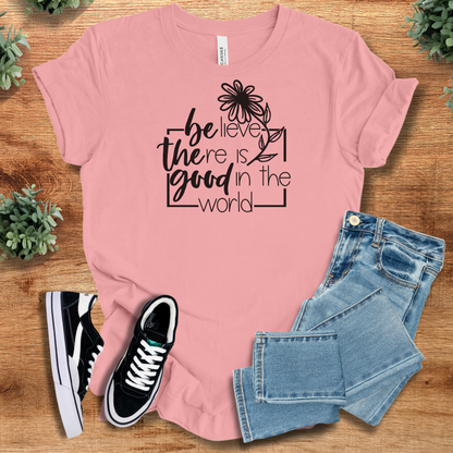 Athletic-heather t-shirt with '' text, flat lay styled on a wooden surface.