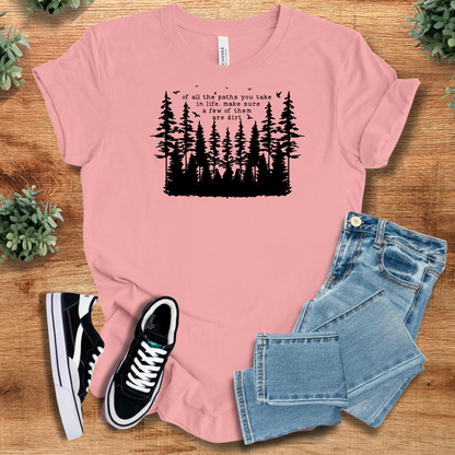 Yellow t-shirt with '' text, flat lay styled on a wooden surface.