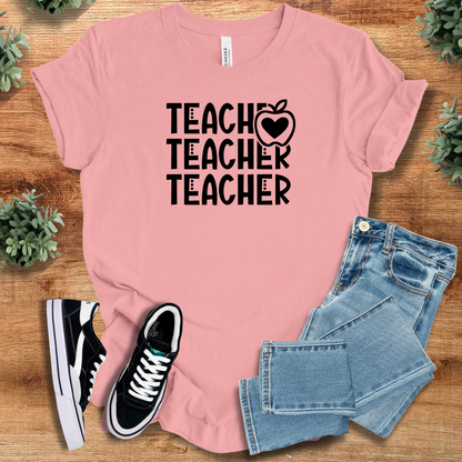 Athletic-heather t-shirt with '' text, flat lay styled on a wooden surface.
