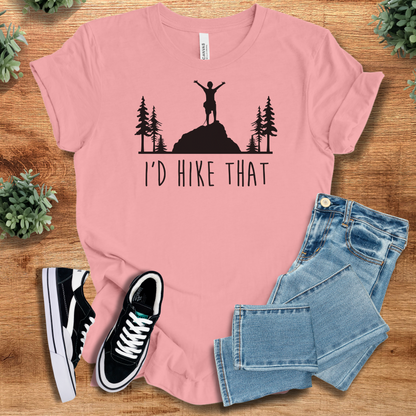 Heather-mauve t-shirt with '' text, flat lay styled on a wooden surface.
