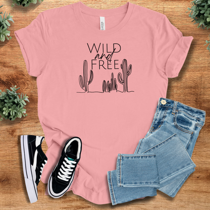 Heather-navy t-shirt with '' text, flat lay styled on a wooden surface.