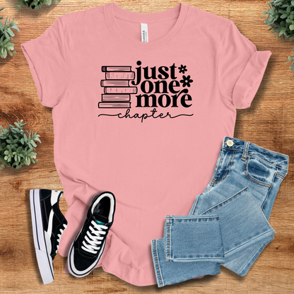 Heather-aqua t-shirt with '' text, flat lay styled on a wooden surface.