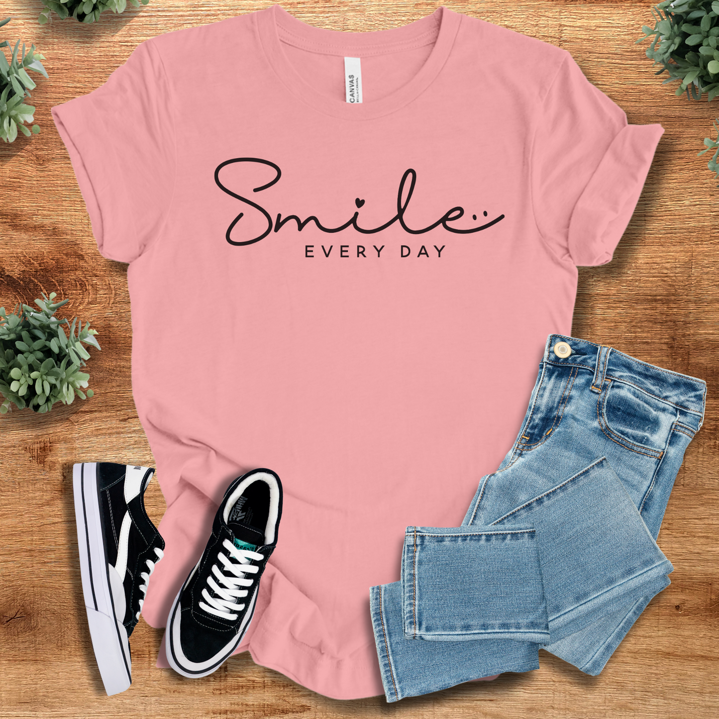 Pink Smile Every Day T‑Shirt on Bella+Canvas 3001, styled with denim and sneakers. Soft unisex tee with minimalist graphic for positive vibes.