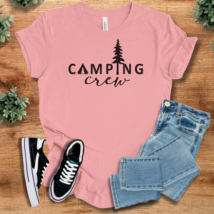 Heather-aqua t-shirt with '' text, flat lay styled on a wooden surface.