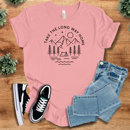 Heather-aqua t-shirt with '' text, flat lay styled on a wooden surface.
