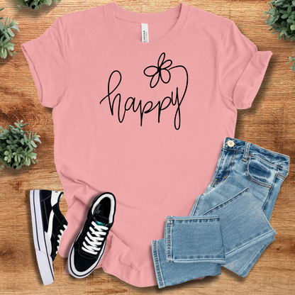 Yellow t-shirt with '' text, flat lay styled on a wooden surface.