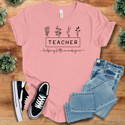 Soft-cream t-shirt with '' text, flat lay styled on a wooden surface.
