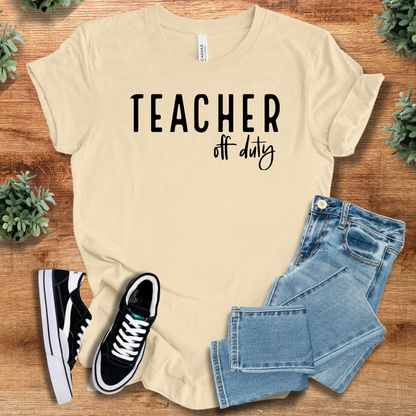 Athletic-heather t-shirt with '' text, flat lay styled on a wooden surface.