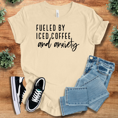Athletic-heather t-shirt with '' text, flat lay styled on a wooden surface.