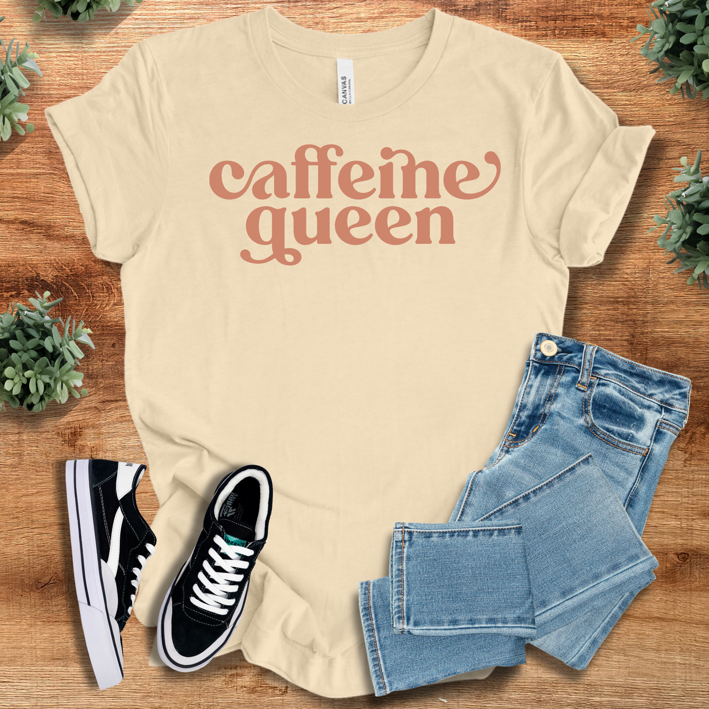Caffeine Queen - Coffee Lovers T-Shirt in cream beige with brown text. 100% cotton tee styled for casual coffee-inspired fashion.