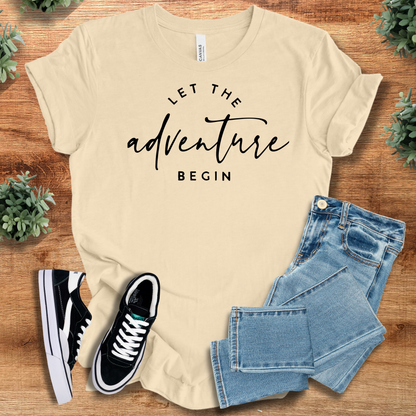 Athletic-heather t-shirt with '' text, flat lay styled on a wooden surface.