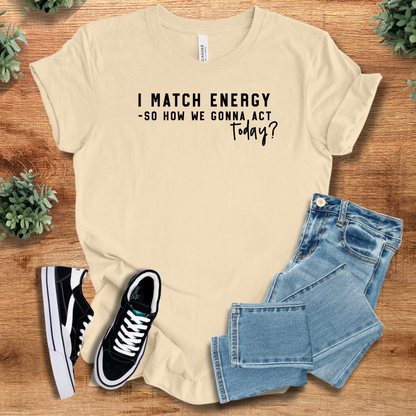 Athletic-heather t-shirt with '' text, flat lay styled on a wooden surface.