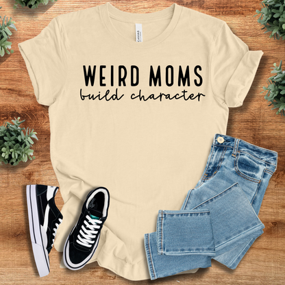 Athletic-heather t-shirt with '' text, flat lay styled on a wooden surface.