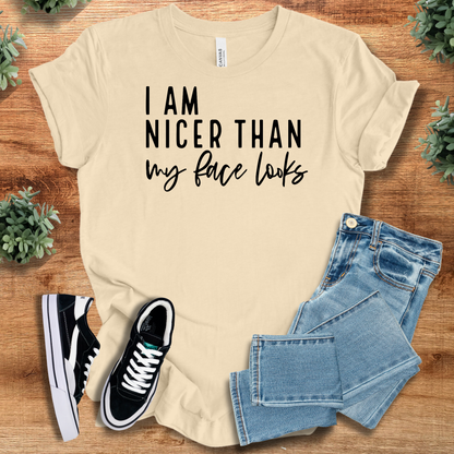 Athletic-heather t-shirt with '' text, flat lay styled on a wooden surface.