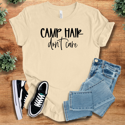 Athletic-heather t-shirt with '' text, flat lay styled on a wooden surface.