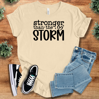 Athletic-heather t-shirt with '' text, flat lay styled on a wooden surface.