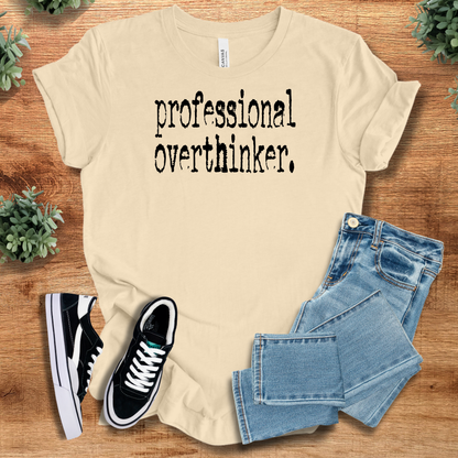 Heather-aqua t-shirt with '' text, flat lay styled on a wooden surface.