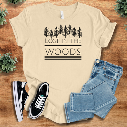 Heather-mauve t-shirt with '' text, flat lay styled on a wooden surface.