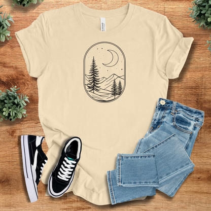 Heather-mauve t-shirt with '' text, flat lay styled on a wooden surface.